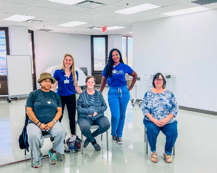 Pictured is Madison and Ashley conducting a fitness class
